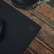 Razer Goliathus Mobile Stealth Edition Mat Razer Logo Closeup - Public Cafe Table (Top-Down Angled View)