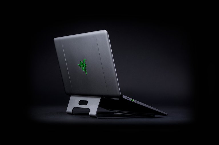 Razer Laptop Stand (Black) with Razer Laptop - Black Background with Light (Back-Angled View)