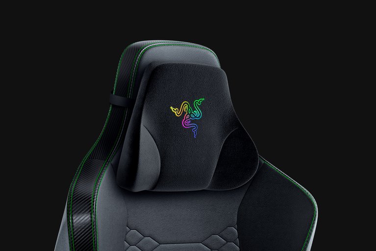 Razer Chroma Head Cushion Closeup with Razer Iskur X - Black Background with Light (Angled View)