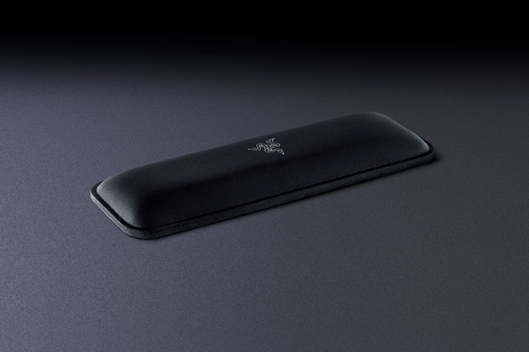 Razer Ergonomic Mouse Rest - Black Background with Light (Angled View)