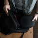 Male Model Storing Razer Headset Case into Backpack