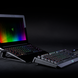 Razer Laptop Stand (Black) with Razer Laptop Workstation - Black Background with Light (Angled View)