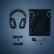 Razer Blackshark V2 Pro (Black) with Accessories and Bag - On Silver Surface with Light