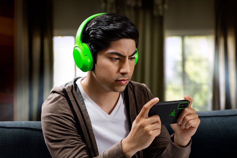 Razer Opus X (Green) on Male Model - Home Gaming