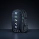 Razer Rogue 15 Backpack V3 (Chromatic) - Black Background with Light (Angled View) Backlit