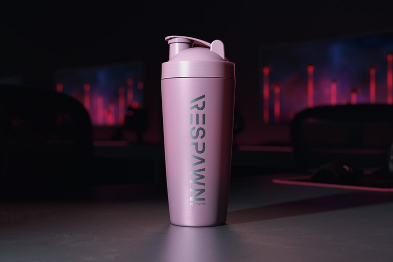 RESPAWN Pink Dual-Insulated Stainless Steel Shaker Cup - on a desk