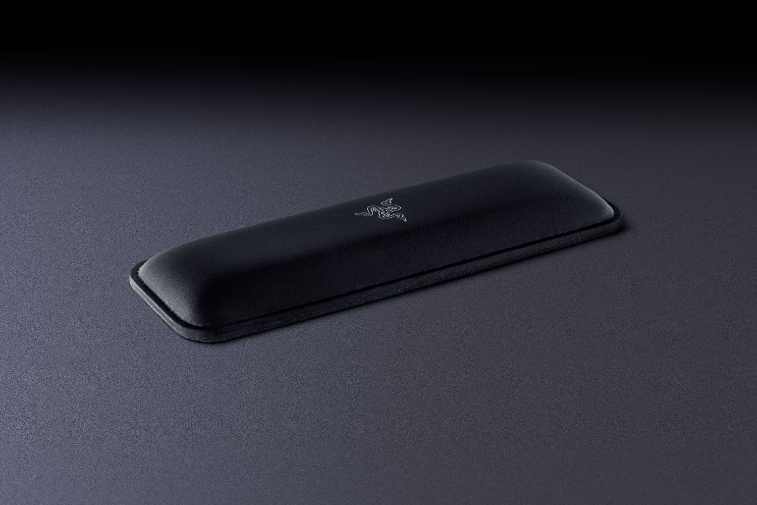 Razer Ergonomic Mouse Rest - Black Background with Light (Angled View)