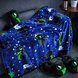 Razer Sneki Snek Fleece Blanket placed on sofa to showcase fabric texture and weight