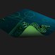 Razer Goliathus Mobile Mat with Underside - Black Background with Light (Angled View)