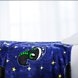Razer Sneki Snek Fleece Blanket on bed closeup to showcase plush fabric texture